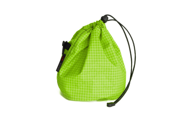 A Medium, clear-bottomed Yarn Stuff Sack in Kiwi (green with white grid) 200 Halcyon.